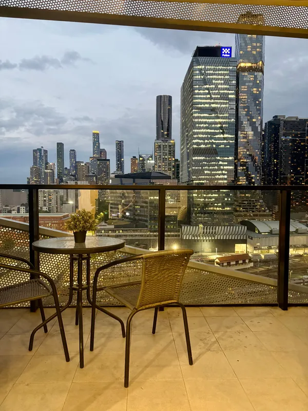 Balcony with city skyline views, Docklands apartment