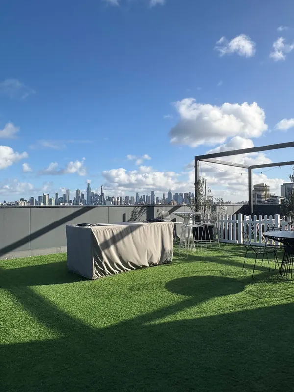 Rooftop terrace with city skyline views, South Yarra apartment building