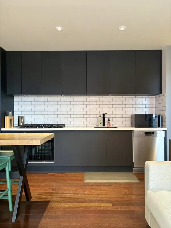 Modern kitchen with subway tiles, Carlton apartment